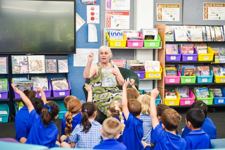 library teacher with students
